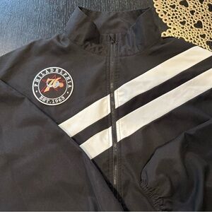 Philadelphia Black and White women’s windbreaker with 76ers logo